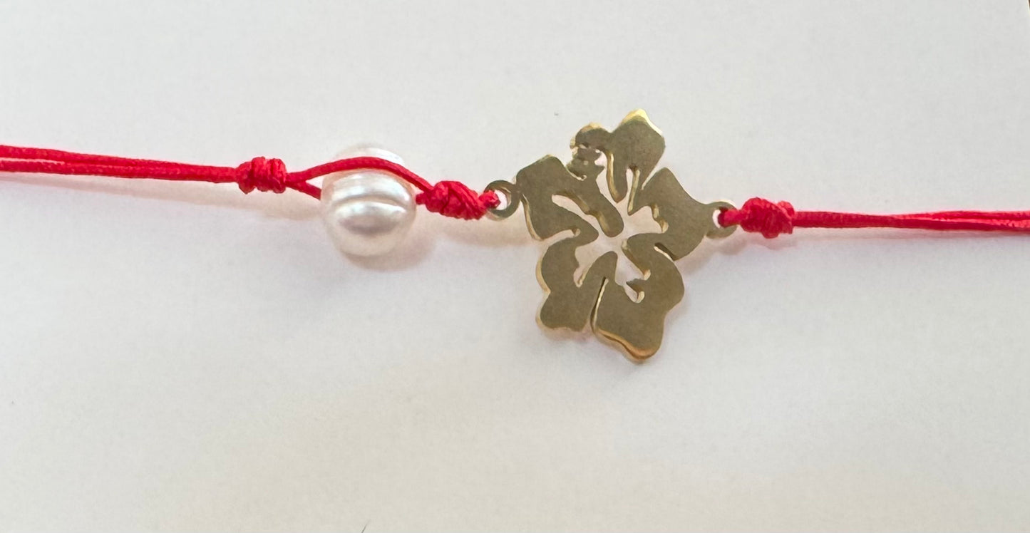 Flor de amapola con perla